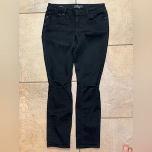Lucky Brand new without tags size 4 with torn knees